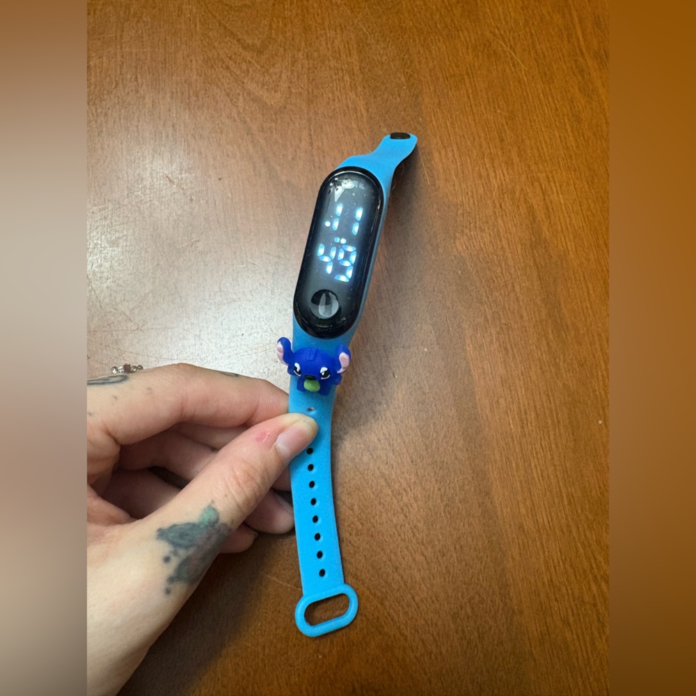 Vibrant Blue Fitness Tracker with Character Charm